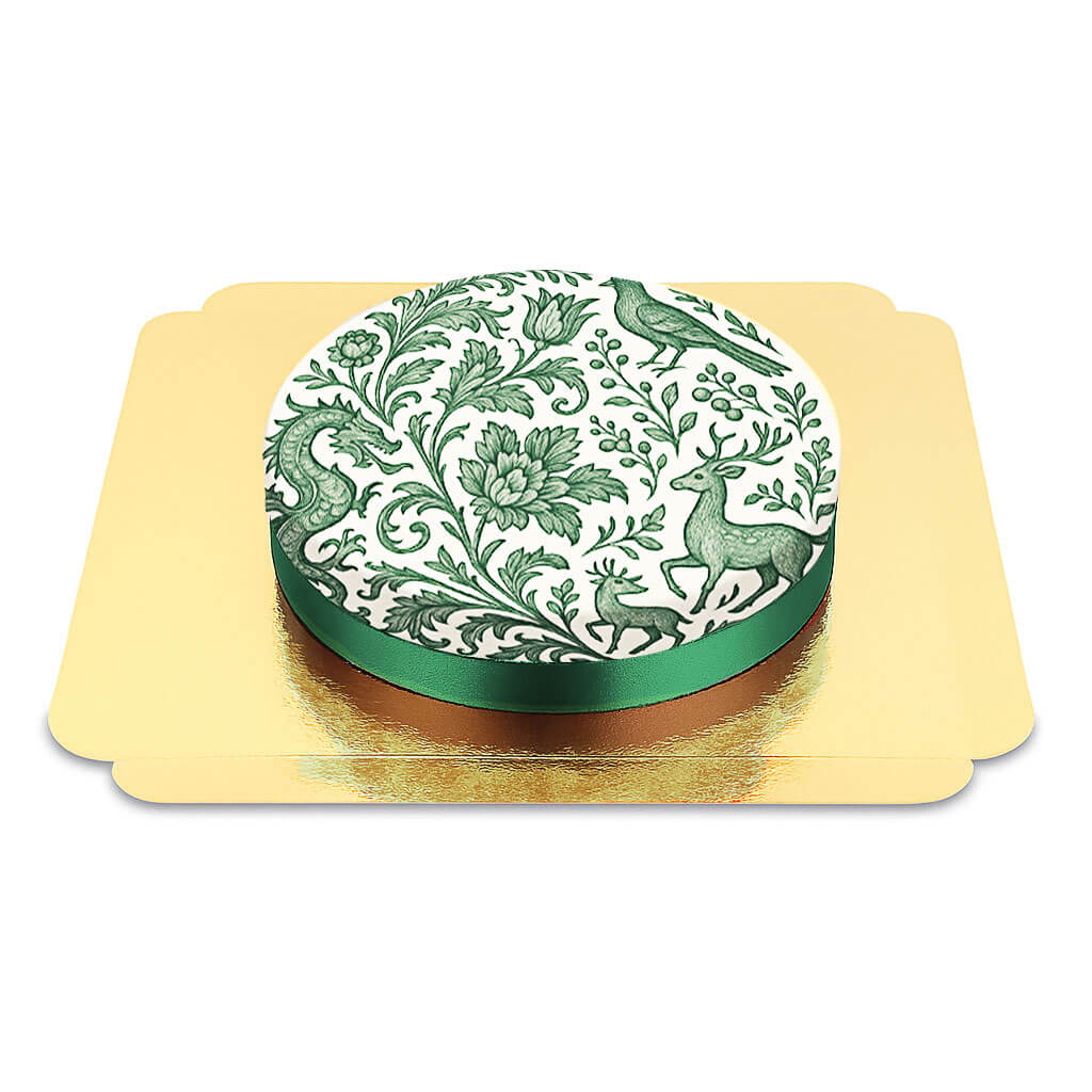 Ciemnozielony tort z malowanym porcelanowym wzorem