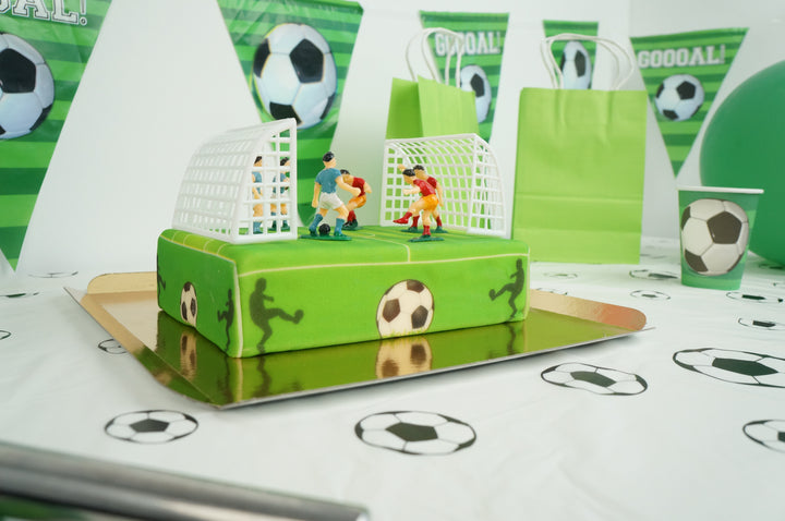 Piłkarze na torcie boiskowym