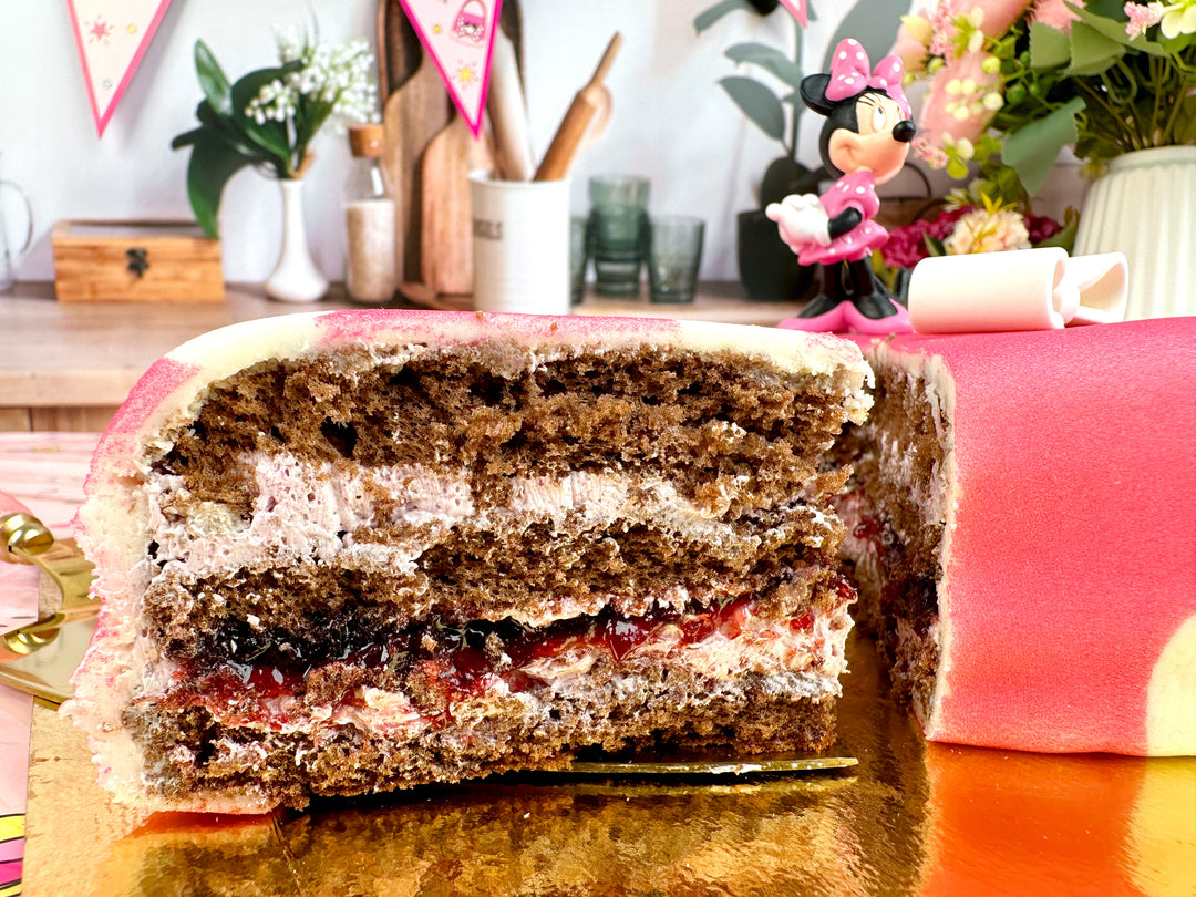 Myszka Minni®e® na torcie w kropeczki z kokardką