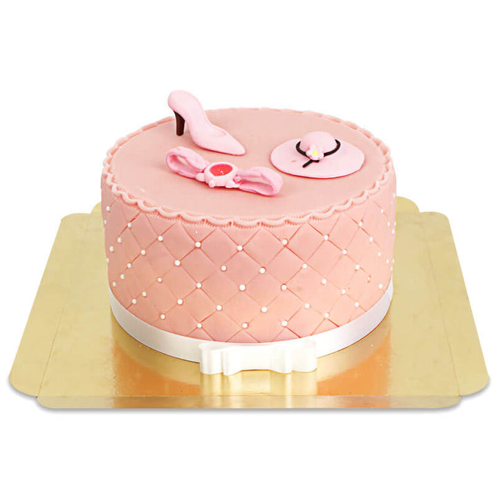 Tort Deluxe Make-Up Cake z kolorową dekoracją cukrową i białą wstążką