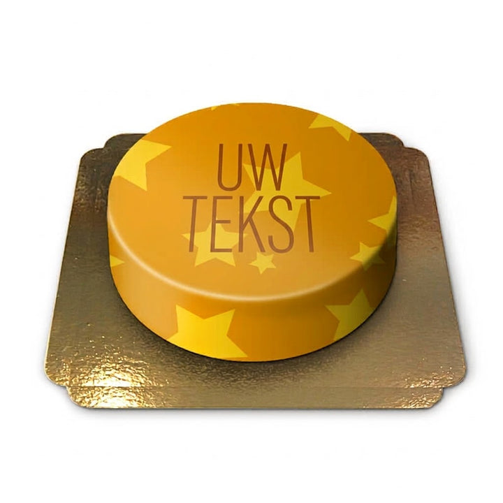 Żółty tort ze wzorem w gwiazdki